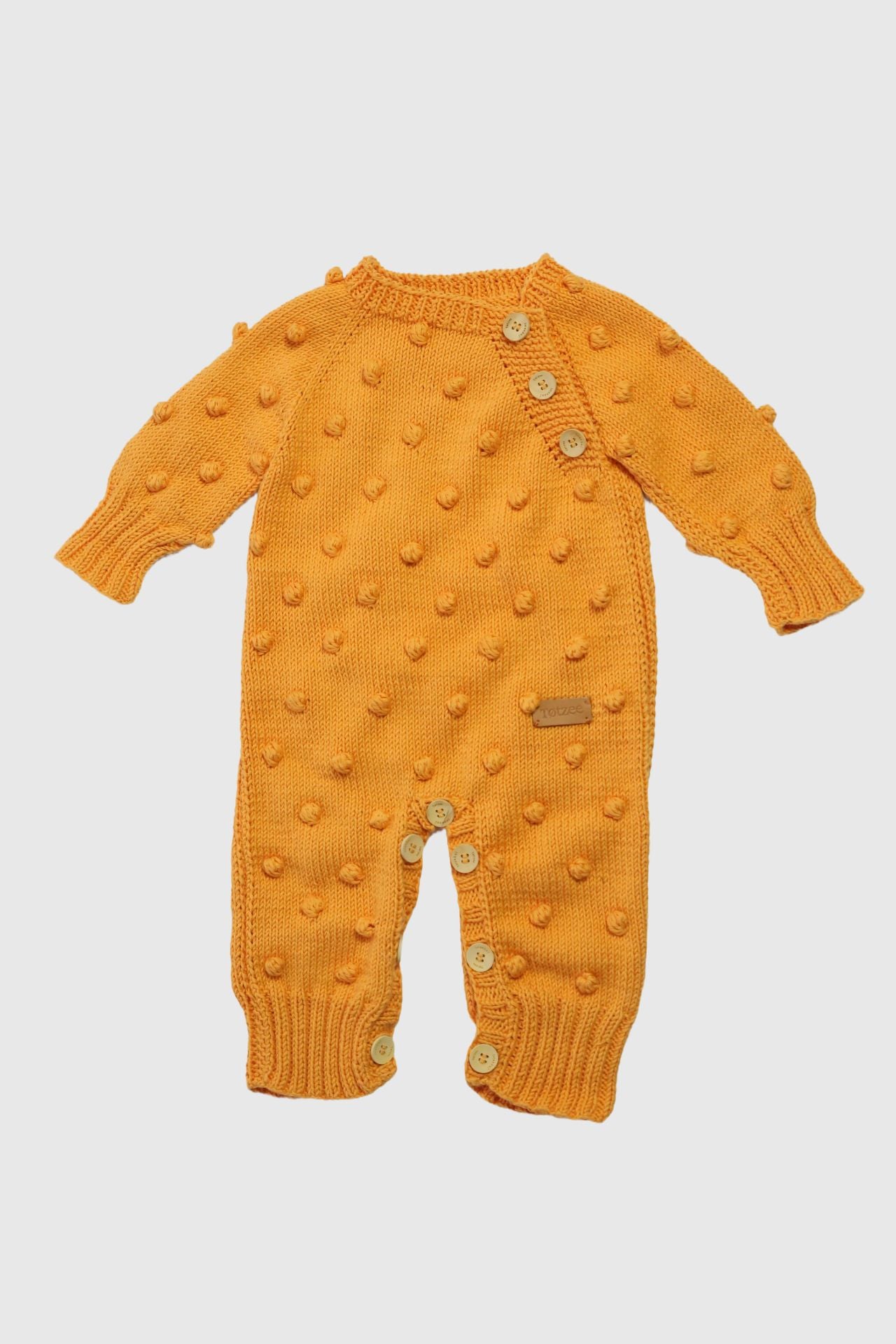 Totzee; Organik El Örgüsü Omuzdan Düğmeli Tulum Kavuniçi; Organic Hand-Knitted Shoulder-Buttoned Romper Pale Orange